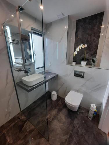 Ένα μπάνιο στο Apartament Mazurek