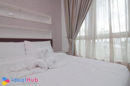 Ein Bett oder Betten in einem Zimmer der Unterkunft Shaftsbury Cyberjaya by IdealHub