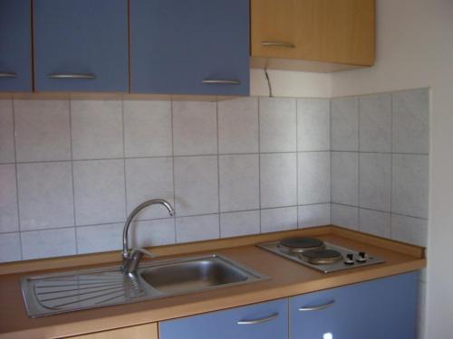 Kuchyňa alebo kuchynka v ubytovaní Apartments Dada