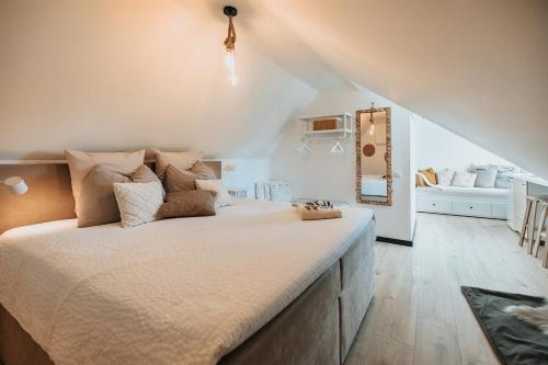 a bedroom with a large bed in a room at Vida Verde in Valkenburg