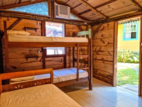 Postel nebo postele na pokoji v ubytování Casa Viva Paraty