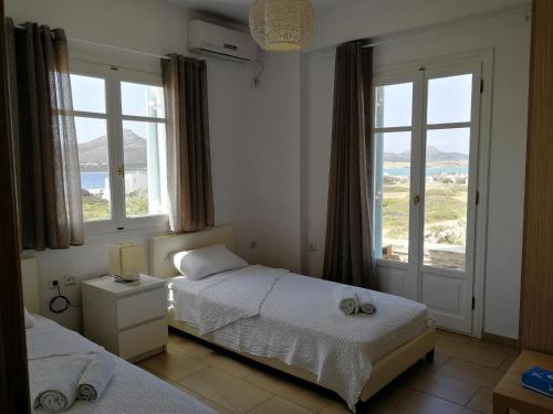 Postel nebo postele na pokoji v ubytování Gio st Gio apartment 1 Antiparos st.Giorgio