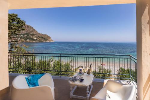 a balcony with a view of the ocean at Dimore di mare - Beachfront Apartments in Santa Flavia