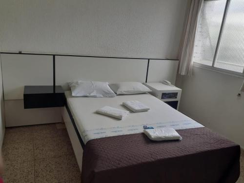 Cama o camas de una habitación en OYO Hotel Village,São Paulo