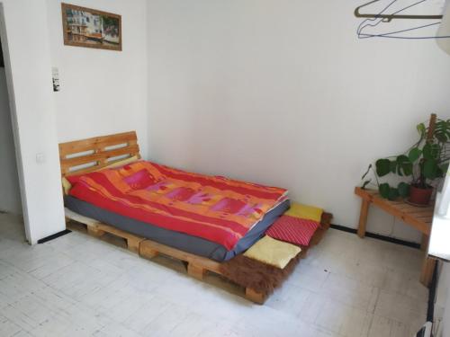 A bed or beds in a room at Andreevskiy mini-hotel