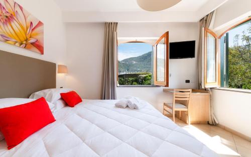 Cama o camas de una habitación en Villa Francesca Relais
