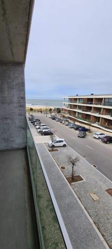 a view of a parking lot from a building at Uno Al Mar - Estúdio Praia in Vila Nova de Gaia