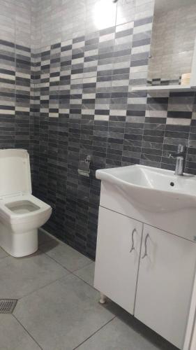 Koupelna v ubytování Tasia Guesthouse