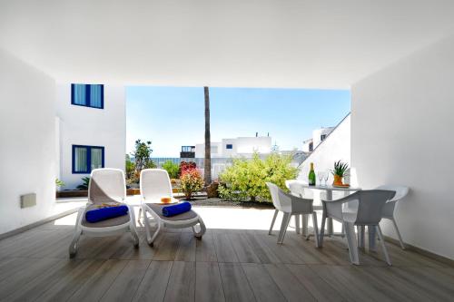 Χώρος καθιστικού στο Aqua Suites