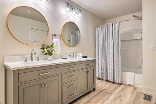 a bathroom with two sinks and a shower at Stunning Highlands Escape with Fireplace and Game Room in Highlands