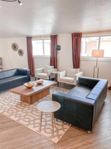 a living room with a couch and a table at Bryce UpTop Lodge in Bryce Canyon