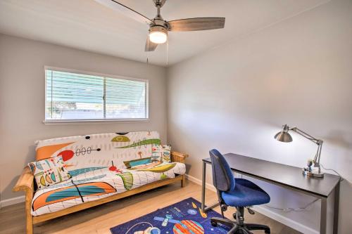 a bedroom with a bed and a desk and a chair at Spacious House with Yard in SLO Wine Country! in San Luis Obispo