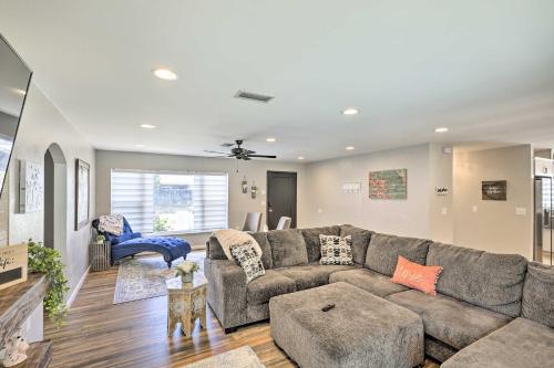 a living room with a couch and a table at Lavish Holiday Home with Lanai and Heated Outdoor Pool in Holiday