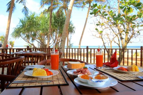 Restoran atau tempat makan lain di Whispering Palms Hotel