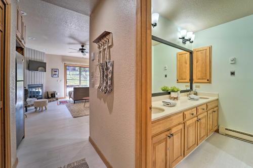 a bathroom with a sink and a mirror at San Juan Mountains Gem, 2 Mi to Purgatory Resort! in Durango Mountain Resort