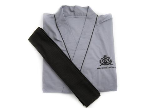 a grey shirt with a black ribbon on it at APA Hotel TKP Nippori Ekimae in Tokyo