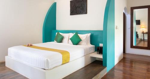 Postel nebo postele na pokoji v ubytování Navutu Dreams Resort & Wellness Retreat