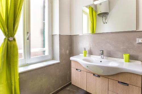Ένα μπάνιο στο Nonna Adelina Apartments & rooms