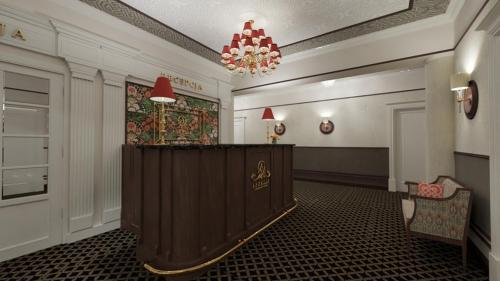 a lobby with a podium in the middle of a room at Arkadia in Radziejów