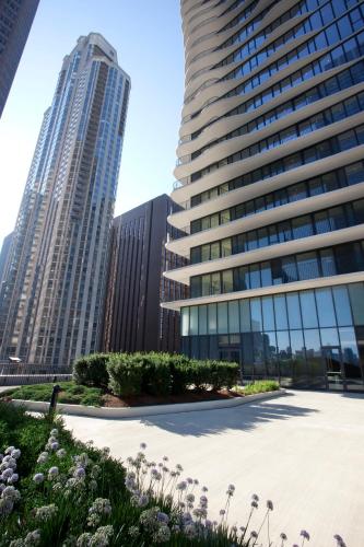 a group of tall buildings in a city at Radisson Blu Aqua Hotel, Chicago in Chicago