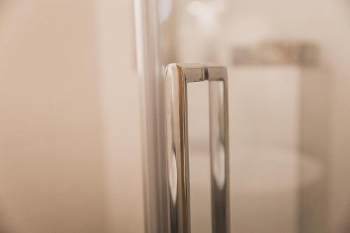 a close up of a stainless steel refrigerator door at Weingut Gehlen-Cornelius in Brauneberg