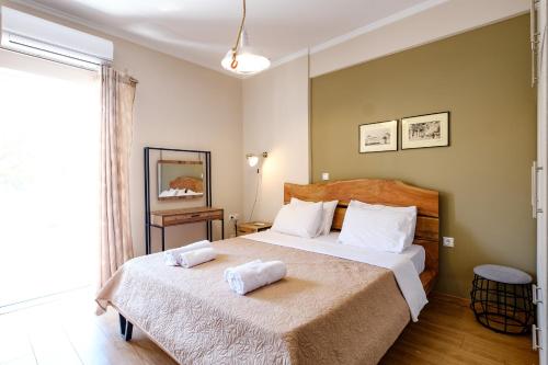 Een bed of bedden in een kamer bij Oreon Suites - Usia