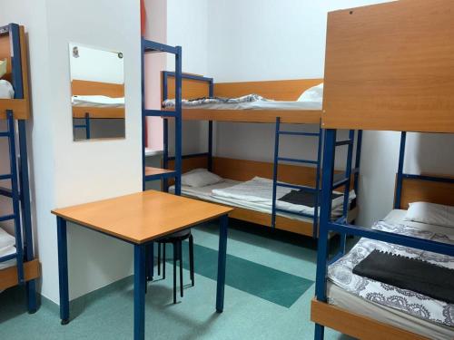 Postel nebo postele na pokoji v ubytování Schronisko na Wyspie