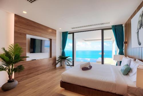 Ένα ή περισσότερα κρεβάτια σε δωμάτιο στο Villa The Wave 2 Residence