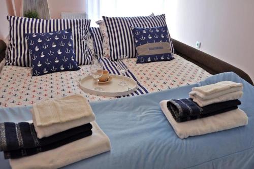 Llit o llits en una habitació de Baltic Edge Apartments