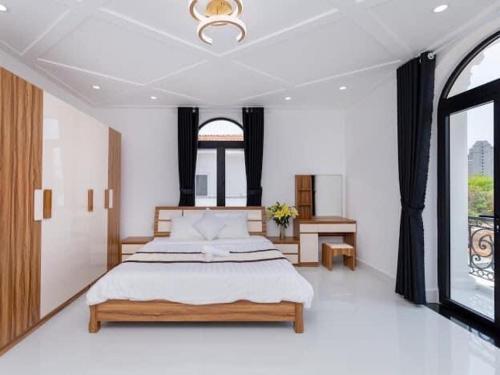 Ένα ή περισσότερα κρεβάτια σε δωμάτιο στο Pallas Villa