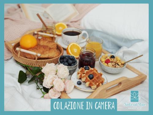 Φωτογραφία από το άλμπουμ του Ninfa Sul Mare Apartments 50 M E T R I dal Mare Best Breakfast and Free Parking σε Capo Vaticano