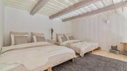 Cama o camas de una habitación en Domačija Pri Momi