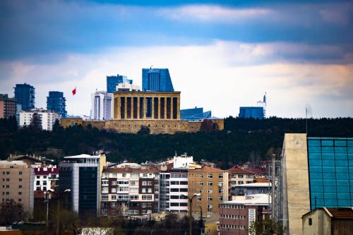 a view of a city with buildings in the background at Ankara Santral Otel in Altındağ