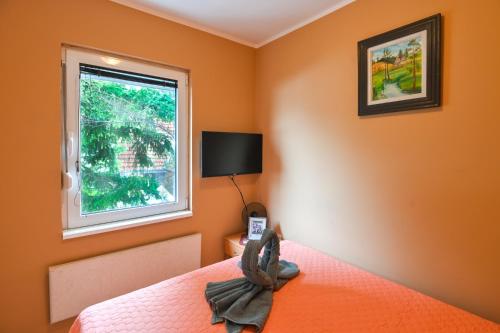Postel nebo postele na pokoji v ubytování Apartman Ristivojevic Zlatibor