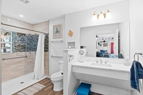 A bathroom at Dolphin Cove - Whole WATERFRONT House with Dock