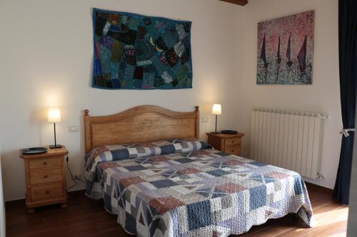 Säng eller sängar i ett rum på Agriturismo Terra dei Falchi