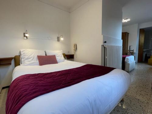 Auberge du Point Sublimeにあるベッド