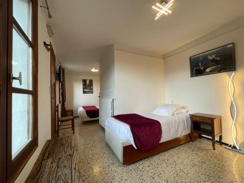 Auberge du Point Sublimeにあるベッド