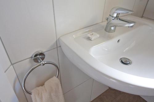 Ванная комната в Hotel Garni Goldener Anker