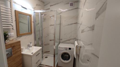 Kúpeľňa v ubytovaní Apartamenty AgPa7