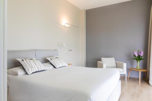 Ένα ή περισσότερα κρεβάτια σε δωμάτιο στο Luxury Lake View Apartments
