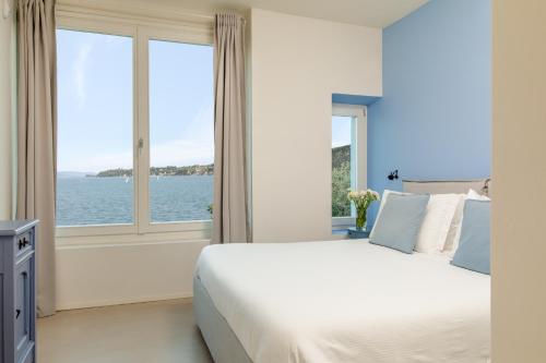 Ένα ή περισσότερα κρεβάτια σε δωμάτιο στο Luxury Lake View Apartments