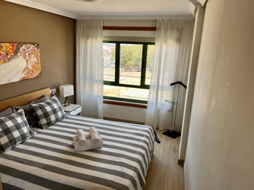 Posteľ alebo postele v izbe v ubytovaní Casa City