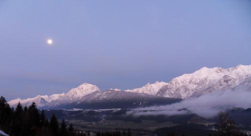 a view of a mountain range with snow covered mountains at Appartements Anfang in Weerberg