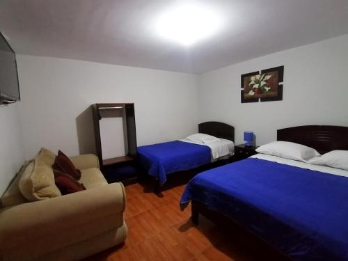 Postel nebo postele na pokoji v ubytování Hotel la encantada