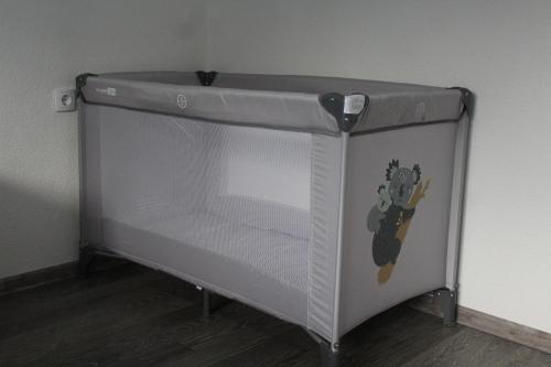 a small white refrigerator with a sticker on it at Apartman Amina-Ahmad Vinac-Jajce in Jajce