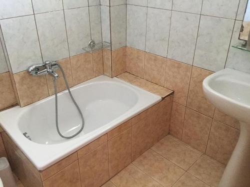 Kúpeľňa v ubytovaní Villa Kalandra