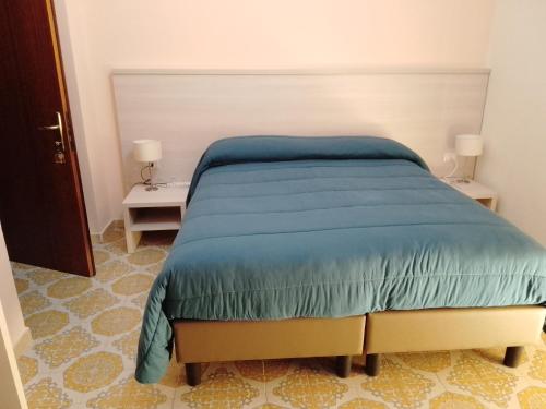 En eller flere senge i et værelse på Albergo Maria Cristina