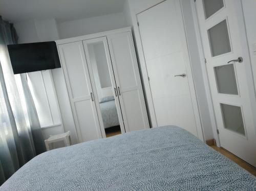 Cama o camas de una habitación en Estudio. Sada, A Coruña.