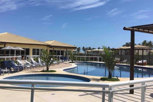 Der Swimmingpool an oder in der Nähe von Baixio - Praia e pé na areia! Ponta de Inhambupe